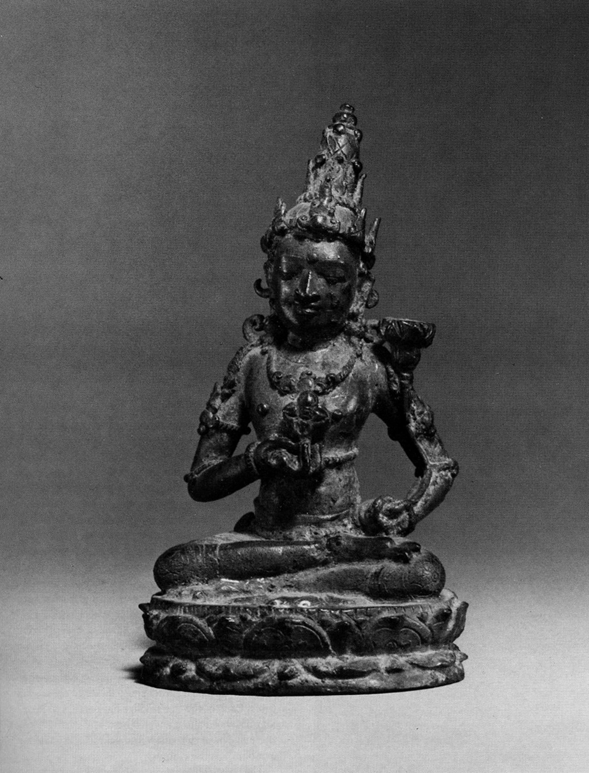 Arca dewa duduk memegang vajra ganda, perunggu, Jawa, abad ke-10, Metropolitan Museum of Art